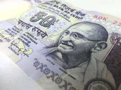 Rupee climbs up